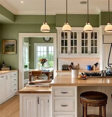 Best wall color with cream cabinets kitchen paint ideas design. Pin by shasha azila on kitchen | Green kitchen walls ...