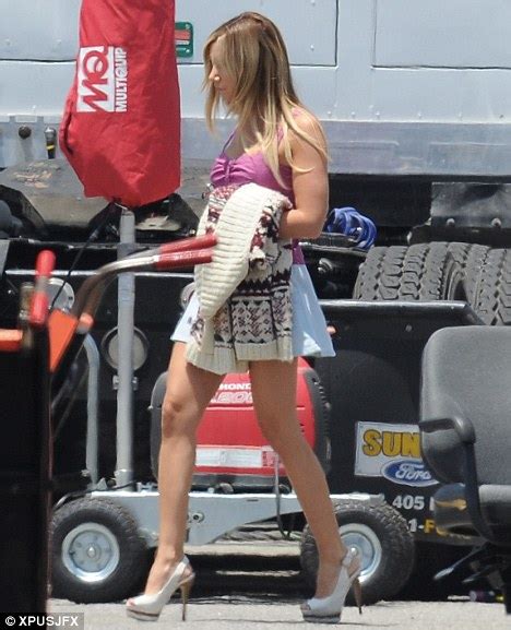 Ashley Tisdale Flaunts Her Toned Legs In A Pair Of Cut Off Denim Shorts