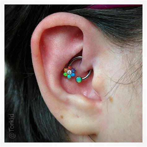 20 Gorgeous Examples Of The Daith Piercing That Will Make You Want One Asap Earings Piercings