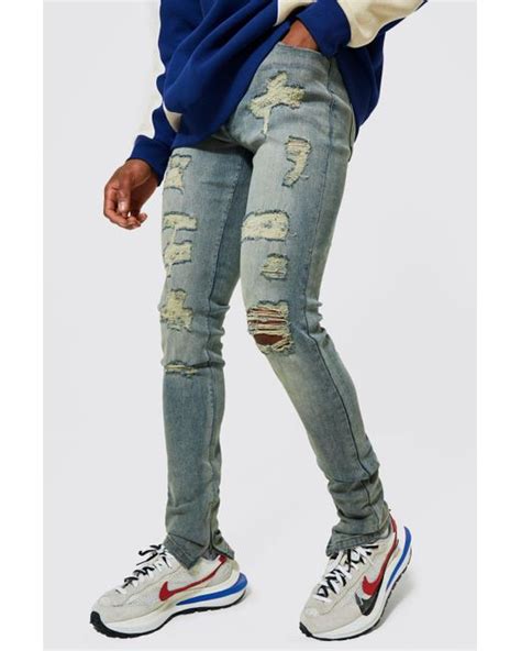 Boohooman Denim Skinny Stacked Distressed Rip Jeans In Blue For Men Lyst