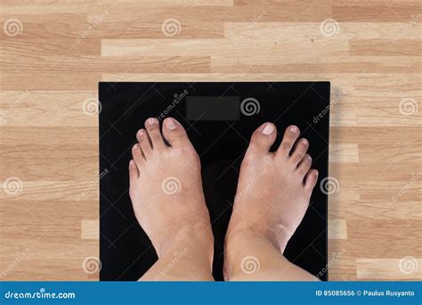 Female Barefoot Standing On Hard Cement Pathway Royalty Free Stock Photography CartoonDealer