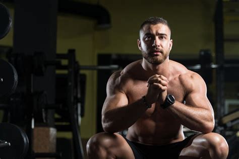 Premium Photo Muscular Man After Exercise Resting In Gym