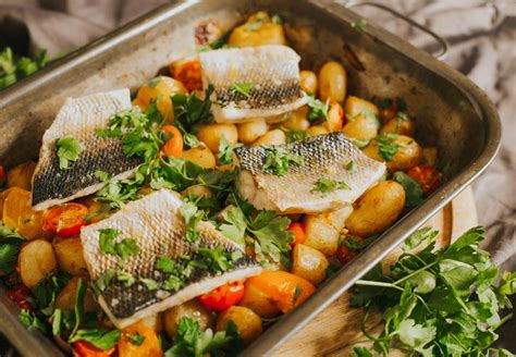 Oven Baked Sea Bass With New Potatoes Tomatoes And Almonds Greendale Farm Shop