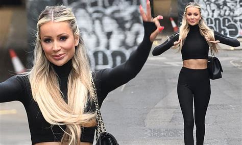 Olivia Attwood Flashes Her Toned Abs As She Attends Screening For