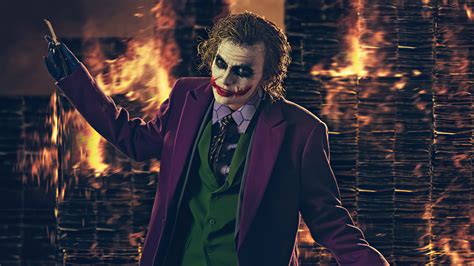 2048x1152 Heath Ledger Joker Cosplay Burning Buildings 4k 2048x1152