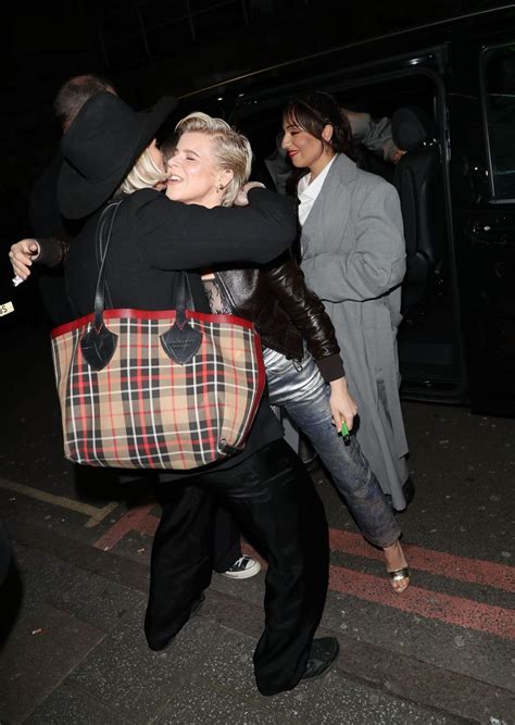robyn makes busty appearance with a friend arrive at the nme awards 14 photos thefappening