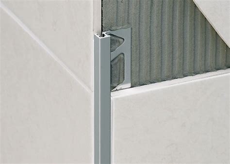Stair tool cuts edges underneath baseboard trim. Aluminum edge trim / for tiles SQUAREJOLLY SJ PROFILITEC ...