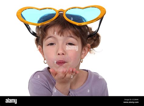Little Girl Blowing Kisses Stock Photo Alamy