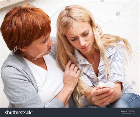 Mother Soothes Crying Daughter Mature Woman Stock Photo 170970089