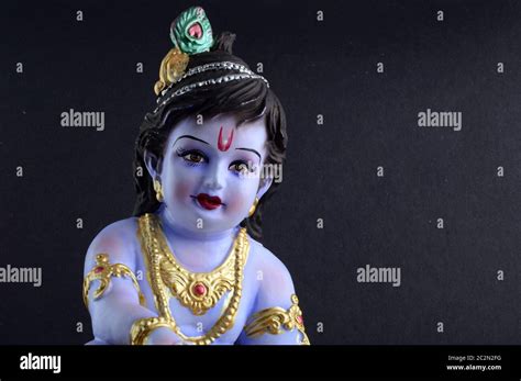 Hindu God Krishna On Dark Background Stock Photo Alamy