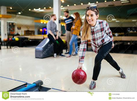 Beautiful Woman Bowling With Friends Stock Photo Image Of Caucasian