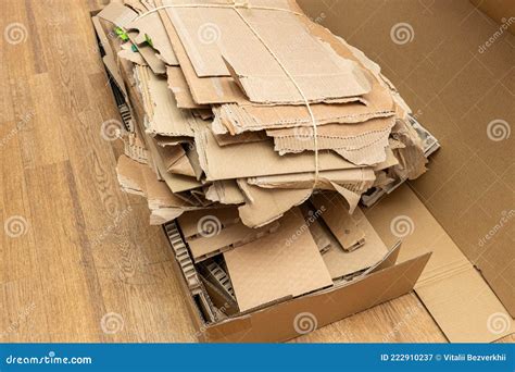 Many Torn Cardboard Boxes Assembled In A Bundle Stack For Recycling