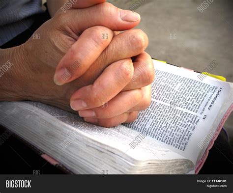 Praying Hands Bible Image And Photo Free Trial Bigstock