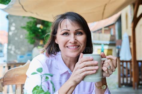middle aged happy woman with ceramic beer mug in german outdoor pub stock image image of women