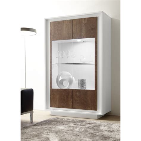 Display cabinet with glass doors in any kind of store and can be fully customized. Amber III modern display cabinet with lights in white and ...