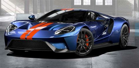 A Blue Sports Car With An Orange Stripe On The Front Is Parked In A Garage