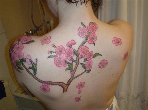 This large red flower with its twin small replicas, resting on the forearm, have a catchy look. Blossom Tattoo: Chinese, Japanese Flower Designs-12 Seductive Ideas | HubPages