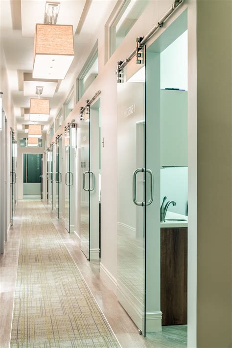 Sliding glass doors for surgical suites. Clear glass for door, frosted