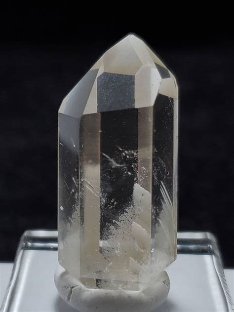 Medium Polished Phantom Quartz Crystal From Brazil With White Chlorite