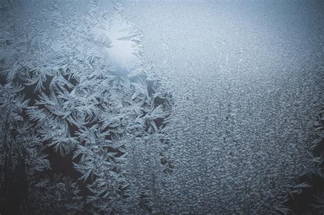 Texture Of Frost And Ice On Glass As A Pattern And Ornament Of A Winter