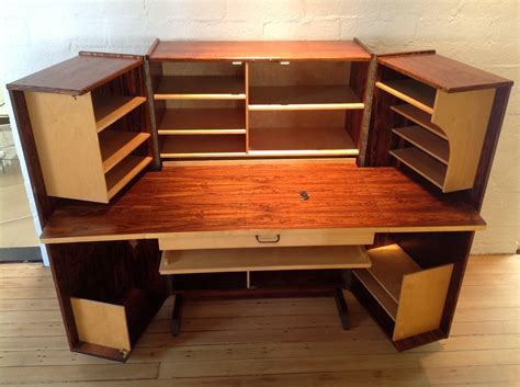 The material used for making is plastic. Rosewood fold-up desk at 1stdibs