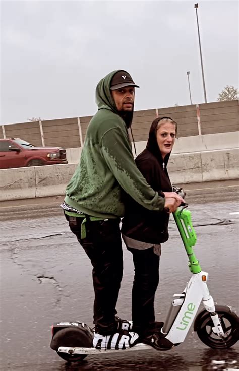 Denver couple drives a Lime scooter on Colorado's I-70 during historic