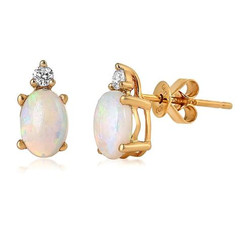 Oval Shaped Opal And Diamond Earrings In 10k Yellow Gold Helzberg Diamonds