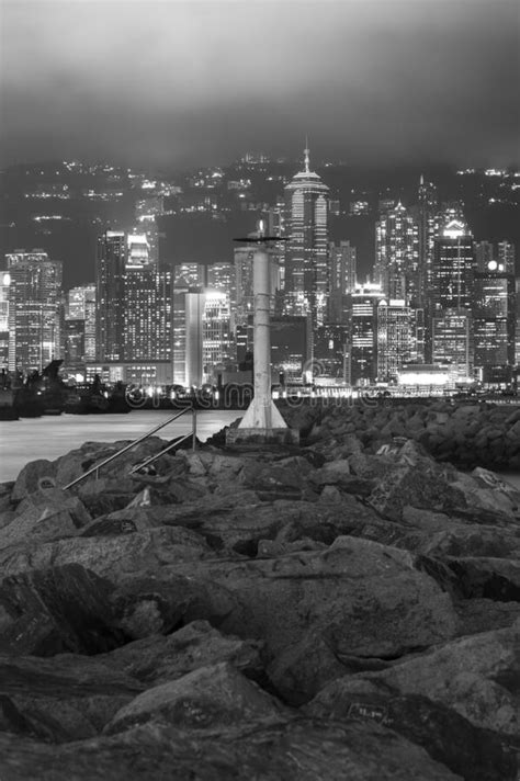 Victoria Harbor Of Hong Kong City At Night Stock Photo