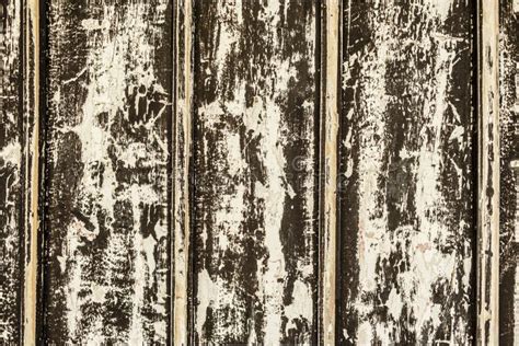 Aged Wood Wall Made Of Planks With Chipped White Paint Stock Image