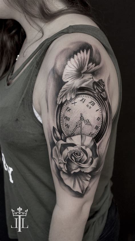 Realistic compass tattoo with a black and white rose and a bird by