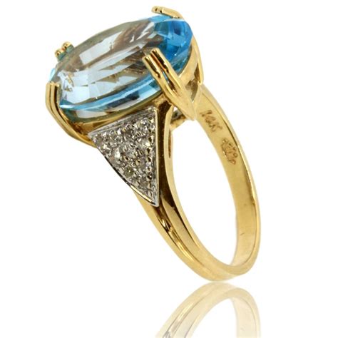 14k gold blue topaz and 13ctw diamond ring upscale consignment