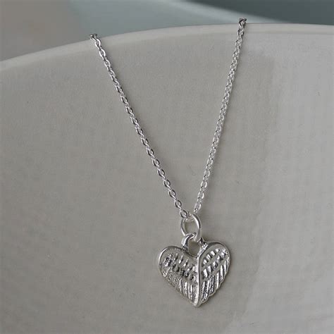 Sterling Silver Angel Wing Heart Necklace By Tales From The Earth