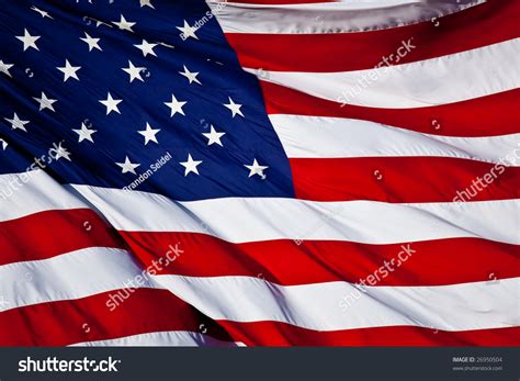 An American Flag Background Waving In The Wind Stock Photo 26950504