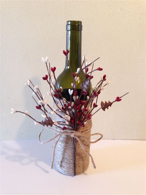 You can make lovely homemade gifts, home decor and even some neat diy lighting with those old wine bottles. Wine decor twine wine bottles wine bottles decorated by ...