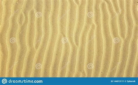Sand Ripples Texture Pattern Shaped With Strong Wind On The Sandy