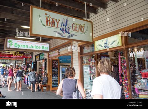 Byron Bay Town Centre With Teenagers On Summer Holiday And Local Shops