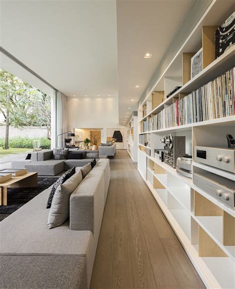 Polished Modern Interior With Dual Level Home Library Home Library