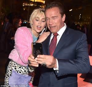 Miley Cyrus Reunites With Her Exs Dad Arnold Schwarzenegger Daily