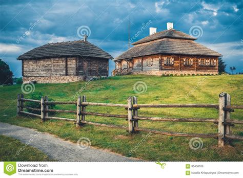 Wooden Ethnic Houses On Rural Landscape Kossovo Brest Region Belarus