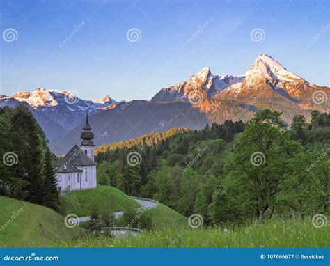 Maria Gern Chapel And Snow Capped Peaks Of Watzmann Mountain Royalty