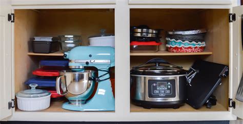 pots appliances pans kitchen organizing organization cabinet