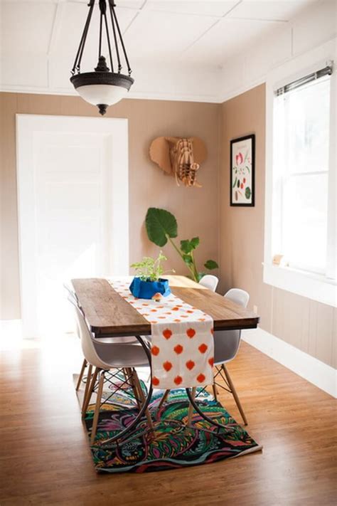 Eclectic dining room featuring a modish dining table and chairs set on top of a stylish area rug and is lighted by gorgeous pendant lights. 10 Super Eclectic Dining Room Interior Design Ideas ...
