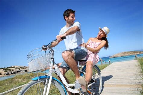 Man Giving Ride To His Girlfriend On Bicycle Stock Image Image Of
