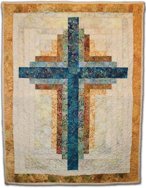 The quilt is easy to make even for beginner quilters. Small Log Cabin Cross Wallhanging | Cross quilt, Log cabin ...