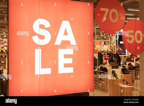 Red Sale Banner On Store Window Promotions And Discounts In Shop Stock