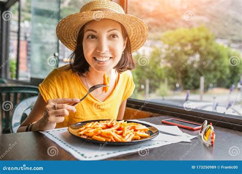 Smiling Woman In Eating Pasta In Restaurant Stock Image Image Of