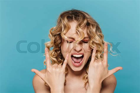 Image Of Positive Half Naked Woman Screaming And Showing Rock Sign With Fingers Stock Image