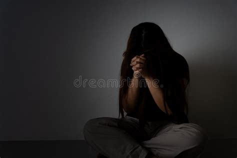 Sad Woman Hug Her Knee And Cry Sitting Alone In A Dark Room Depression Unhappy Stressed And
