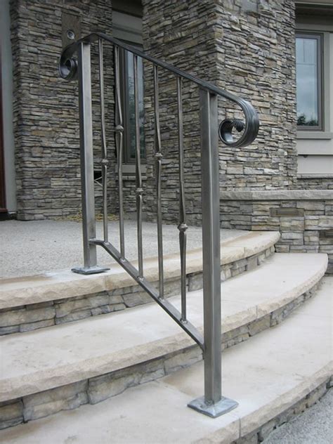Outdoor concrete staircase with stainless steel handrail. Exterior Wrought Iron Stair Railings - Personalized Shapes ...