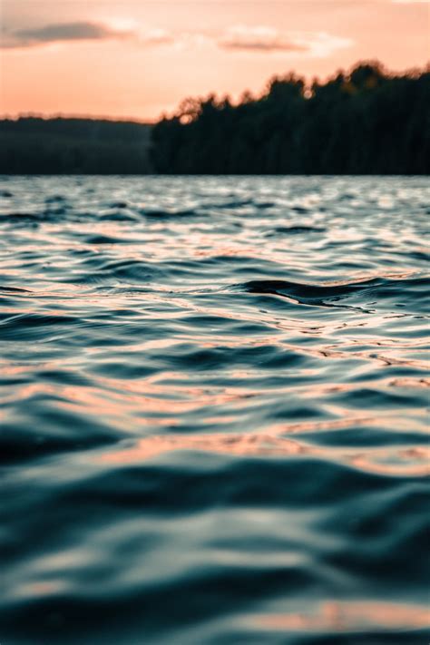 Body Of Water During Golden Hour Photo Free Water Image On Unsplash